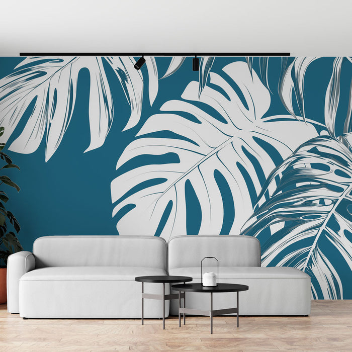 Carta da parati blu teal | Foglie tropicali bianche su uno sfondo blu intenso