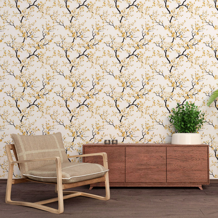 Foto Behang bloemen takken | Elegante zwarte takken versierd met gouden bloemen op een witte achtergrond