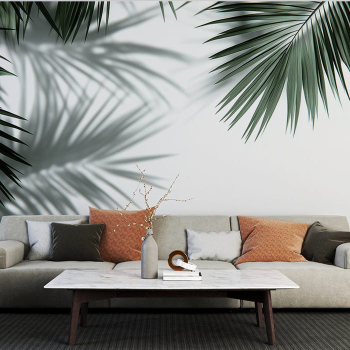 Green and white foliage mural wallpaper | Falling palm leaves and shadows