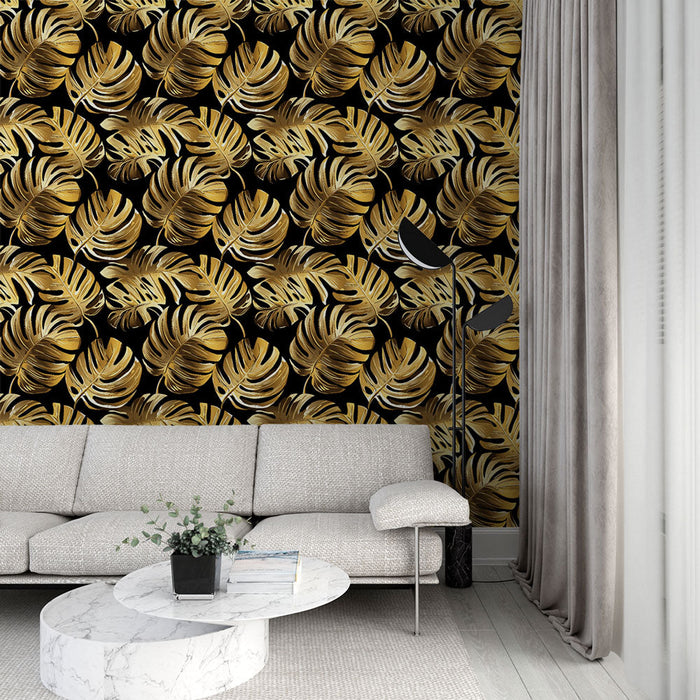 Fényes arany monstera levelek tapéta | Bujával minta fekete háttéren