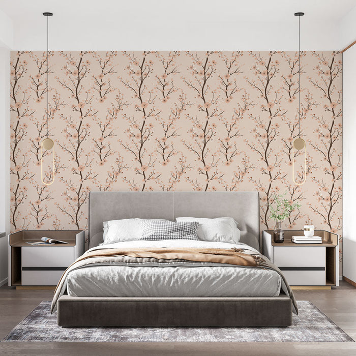 Fototapet med delikate grene og lyserøde blomster på en beige baggrund