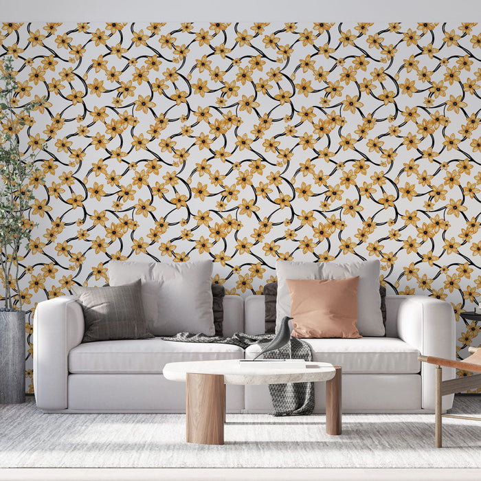 Tapetti elegantilla kuvioinnilla, jossa on keltaisia kukkia valkoisella taustalla.