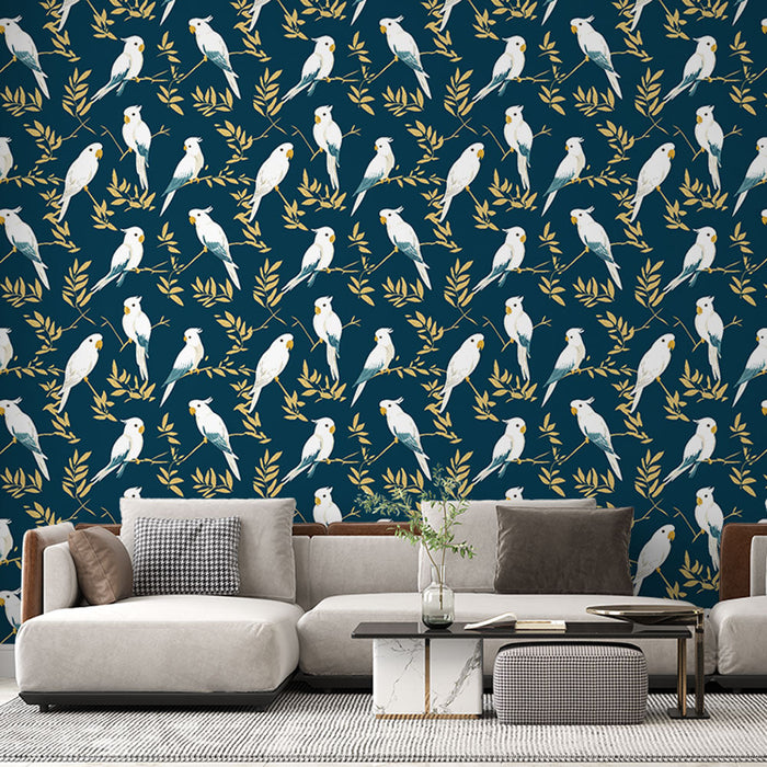 Fototapet fugle | Hvidt fuglemotiv omgivet af gyldent løv på en mørkeblå baggrund