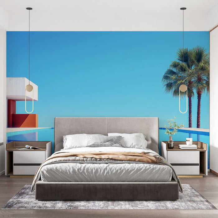 Carta da parati moderna piscina | Una vista serena di una piscina a sfioro e lussureggianti palme