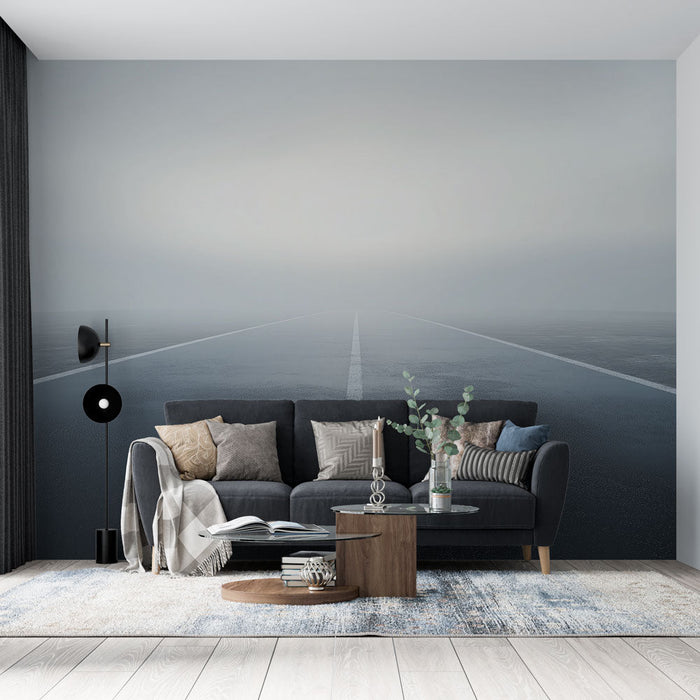 Fototapet tåkete vei | Brolagt vei som krysser et tåkete landskap